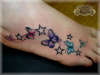 Butterlfys on foot tattoo