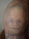 Portrait of my son tattoo