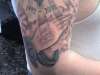 Praying hands tattoo