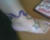 Ribbon and Star tattoo