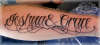 Text on forearm tattoo