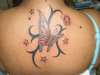butter fly and tribals tattoo