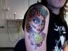 gypsy with glowing skull tattoo