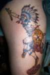 left thigh tattoo
