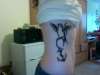 rib piece tattoo