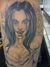 vampire w skulls and roses close up tattoo