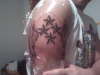 winged stars tattoo