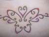 Butterfly on lower back tattoo