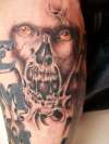 Evil skull tattoo