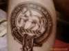 Family Crest with Motto tattoo