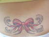 Lower Back Bow tattoo