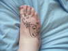 flower foot tattoo