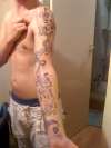 half finished musical sleeve tattoo