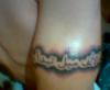 Arabic arm band tattoo