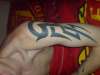 left arm tribal tattoo