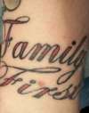 script letters tattoo