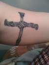 Cross of nails tattoo