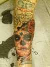 Day of the dead style sleeve tattoo