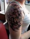 blk gray 1/4 sleeve tattoo