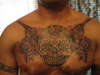 chest piece tattoo