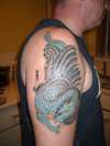 dragon coverin a american eagle tattoo