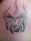 face in flames tattoo