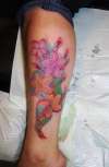 flower leg tattoo