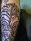 husband's tiger tattoo