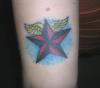 Nautical Star w/ wings tattoo