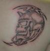Skull with tribal tattoo