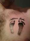 my Daughters feet tattoo