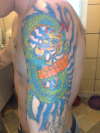 top-arm sleeve tattoo