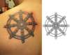 Dharmachakra tattoo