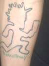 Jamee Novotney HATCHET MAN TAT LEFT INSIDE FOREARM tattoo