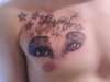 My eyes and name on my mans chest tattoo