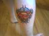 Superman right calf tattoo