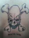 skull in bones memory tattoo