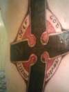 Close up of  N\A Cross tattoo