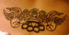 Feminine and Tough. tattoo