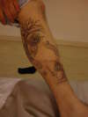 Leg tat tattoo