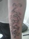 Rose and Scroll tattoo