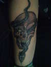Skull snake tattoo