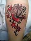Swallow and Nautical Star tattoo
