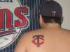 Twins logo from a distance tattoo