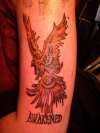 awakened phoenix tattoo