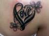 love & flowers tattoo