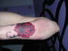 rose cover tattoo