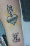 sacred heart / Older brother tattoo