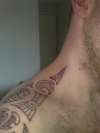 First sitting - polynesian tribal three tattoo