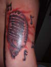 Lk's Mic tattoo